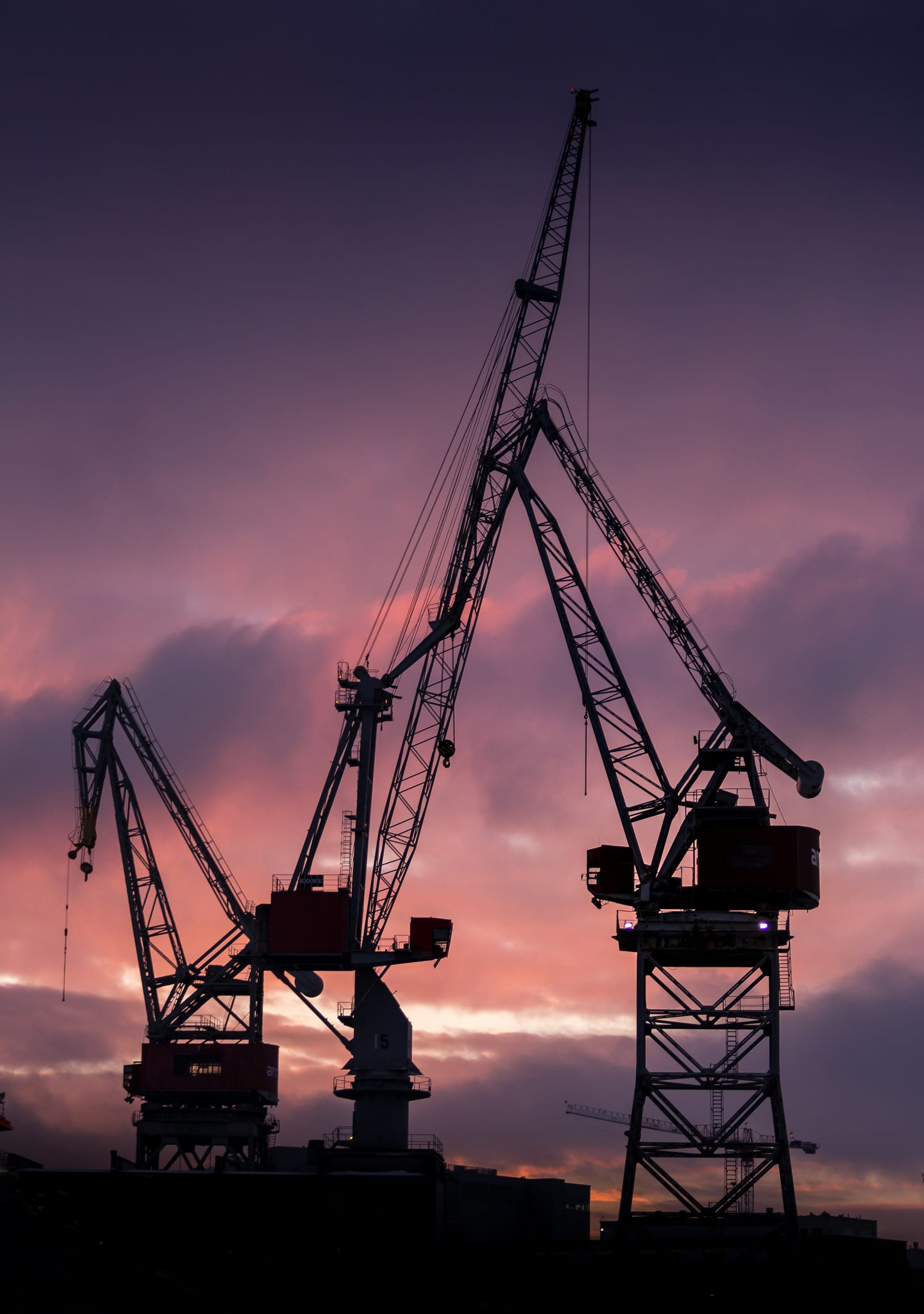 A crane against a dusk sky