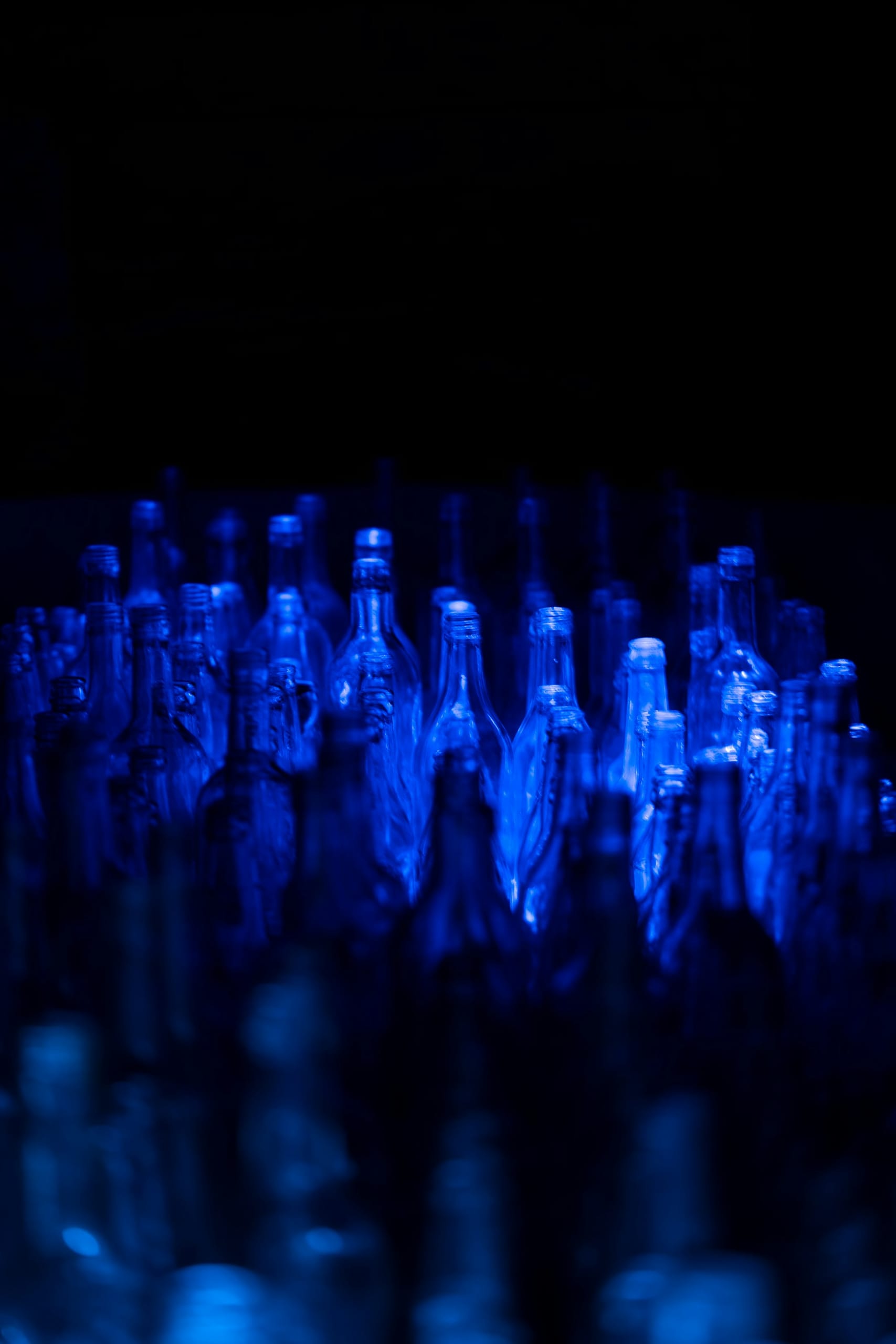 Bottles moving along a production line