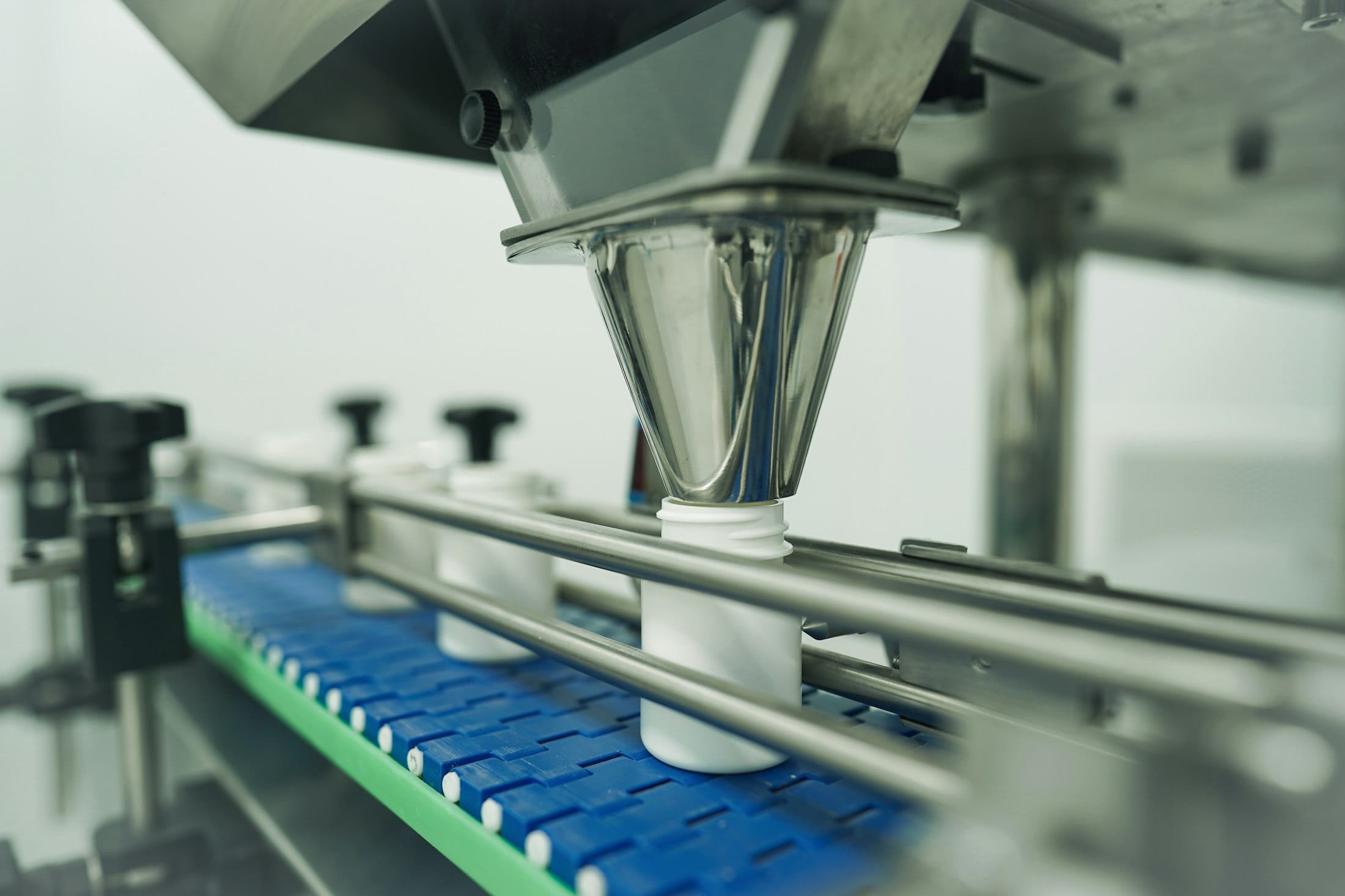 Bottles being filled on an automated pharmaceutical line